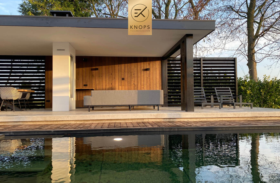 Hippo garden High end tuinontwerp tuinarchitect moderne wellnesstuin met luxe buitenverblijf en luxe poolhouse met zwemvijver 