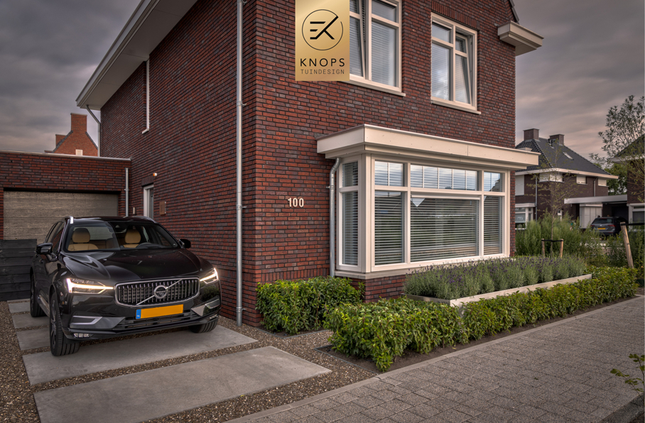 Luxe tuin met overkapping thuiswerken in tuin poolhouse buitenverblijf flexwerken in de tuin polyester sierbakken buitenhaard sierbakken kachel luxe erik knops tuinarchitect