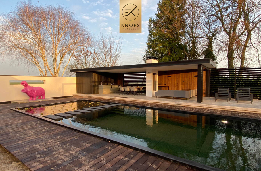 Hippo garden High end tuinontwerp tuinarchitect moderne wellnesstuin met luxe buitenverblijf en luxe poolhouse met zwemvijver 