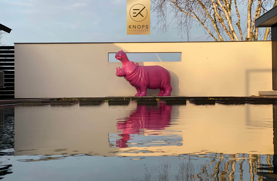 Hippo garden High end tuinontwerp tuinarchitect moderne wellnesstuin met luxe buitenverblijf en luxe poolhouse met zwemvijver 