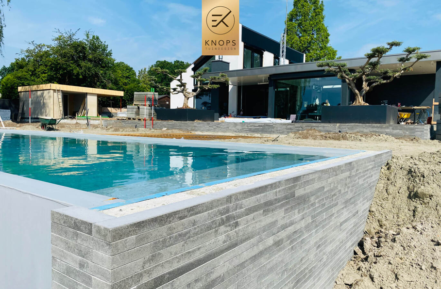 Overloopzwembad infinity pool bonsai zwembad kade water boodje luxe villatuin high end millboard jacuzzi erik knops tuinarchitect tuinontwerp high end hoogtes 