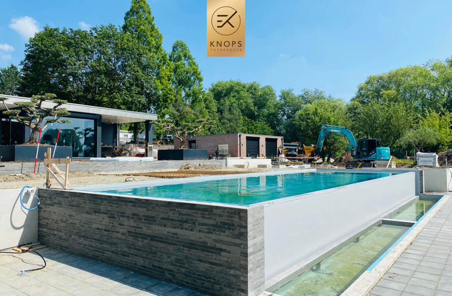 Overloopzwembad infinity pool bonsai zwembad kade water boodje luxe villatuin high end millboard jacuzzi erik knops tuinarchitect tuinontwerp high end hoogtes 